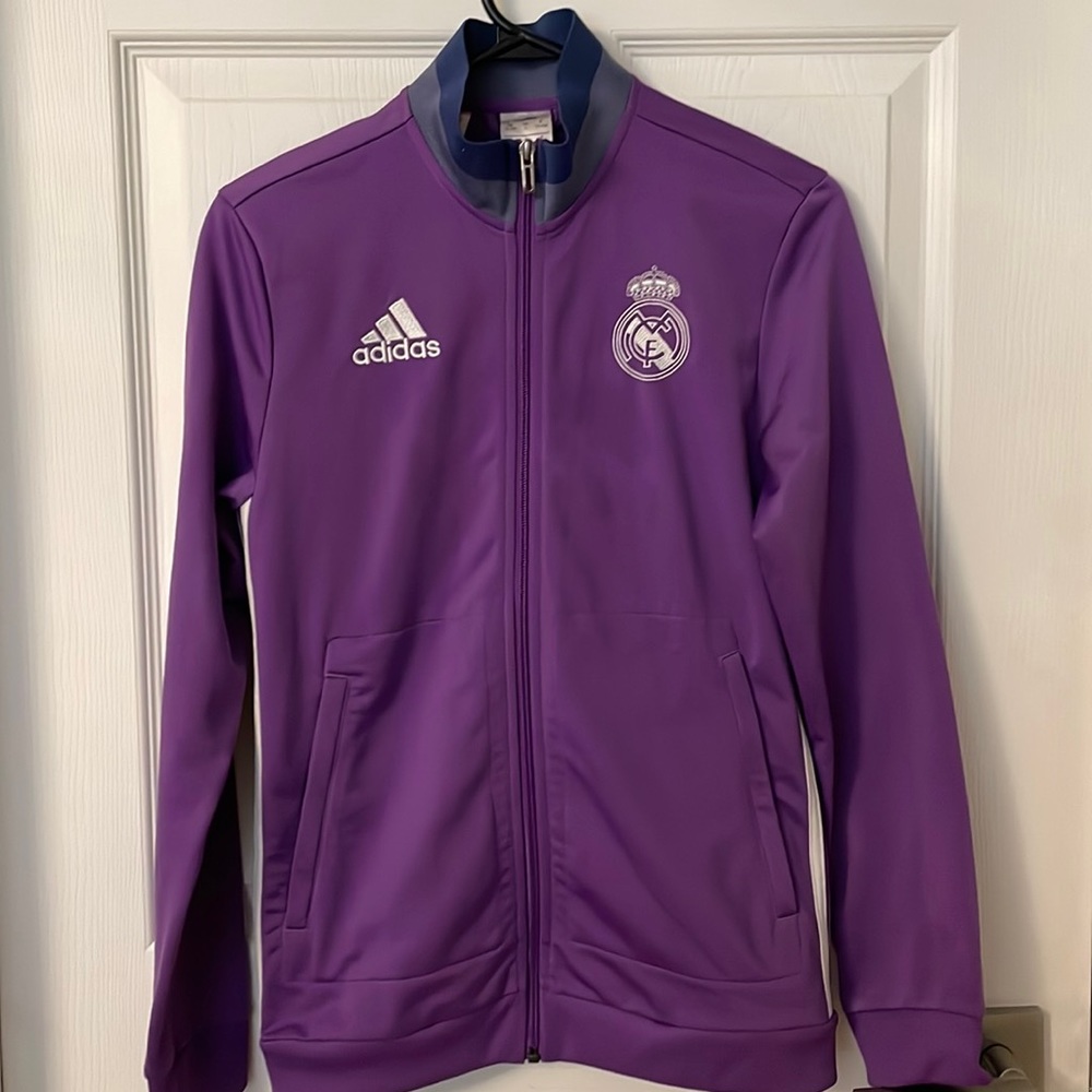 It is an adidas purple jacket it comes in two sizes large and xs
